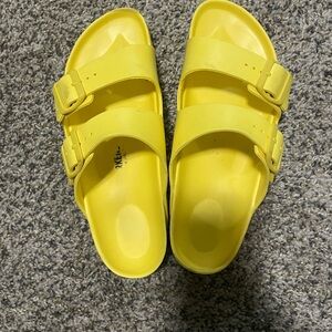 Women’s used yellow Birkenstocks